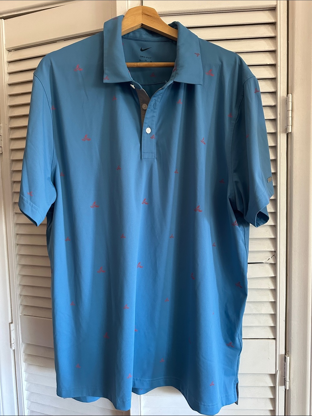 Nike Men's Sky Blue Polo with red lobsters